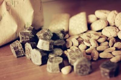 Photograph of nuts and chocolate on a table