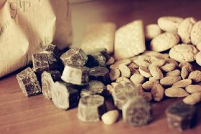 Photograph of nuts and chocolate on a table