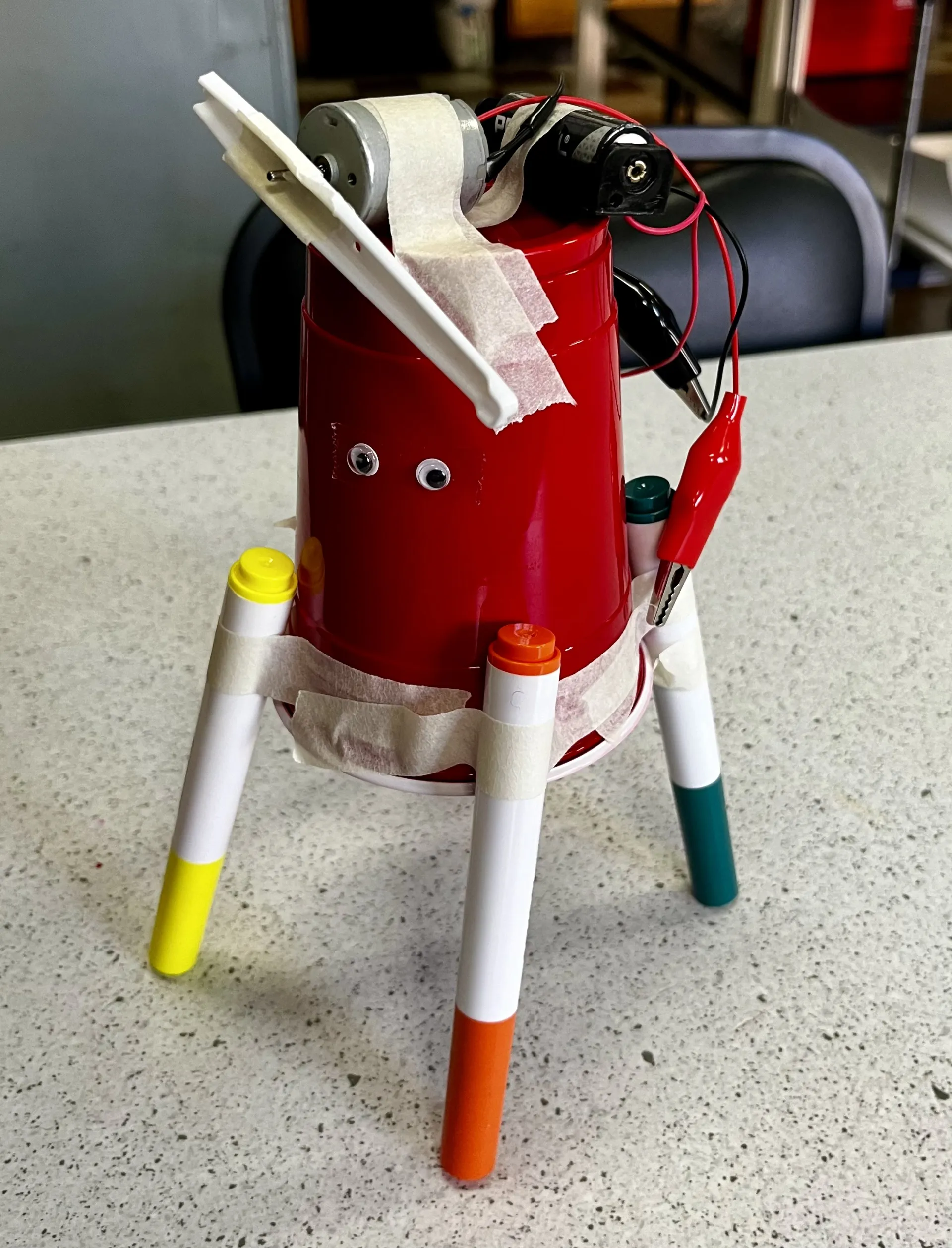 cup with motor and markers 