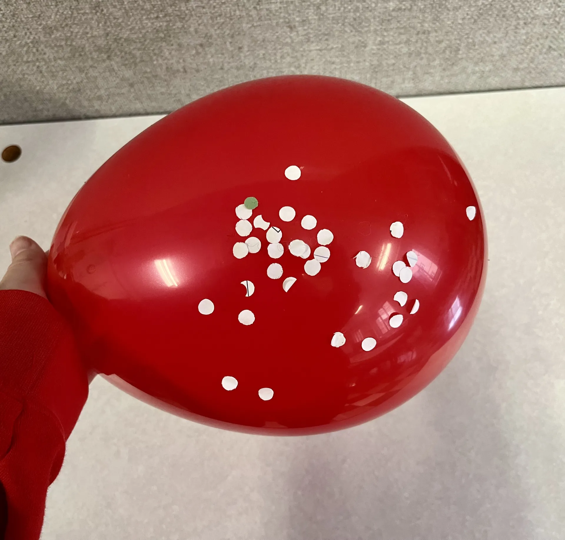 balloon with paper clippings