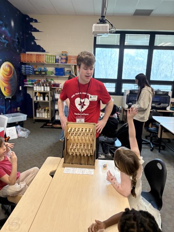 Jordan leading a group of students